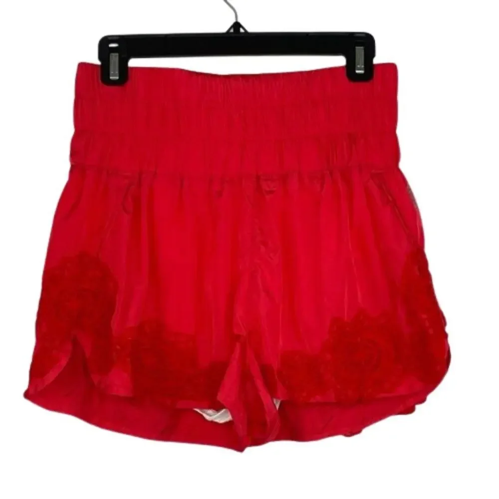 FP Movement Free People neon orange high waisted shorts size Medium